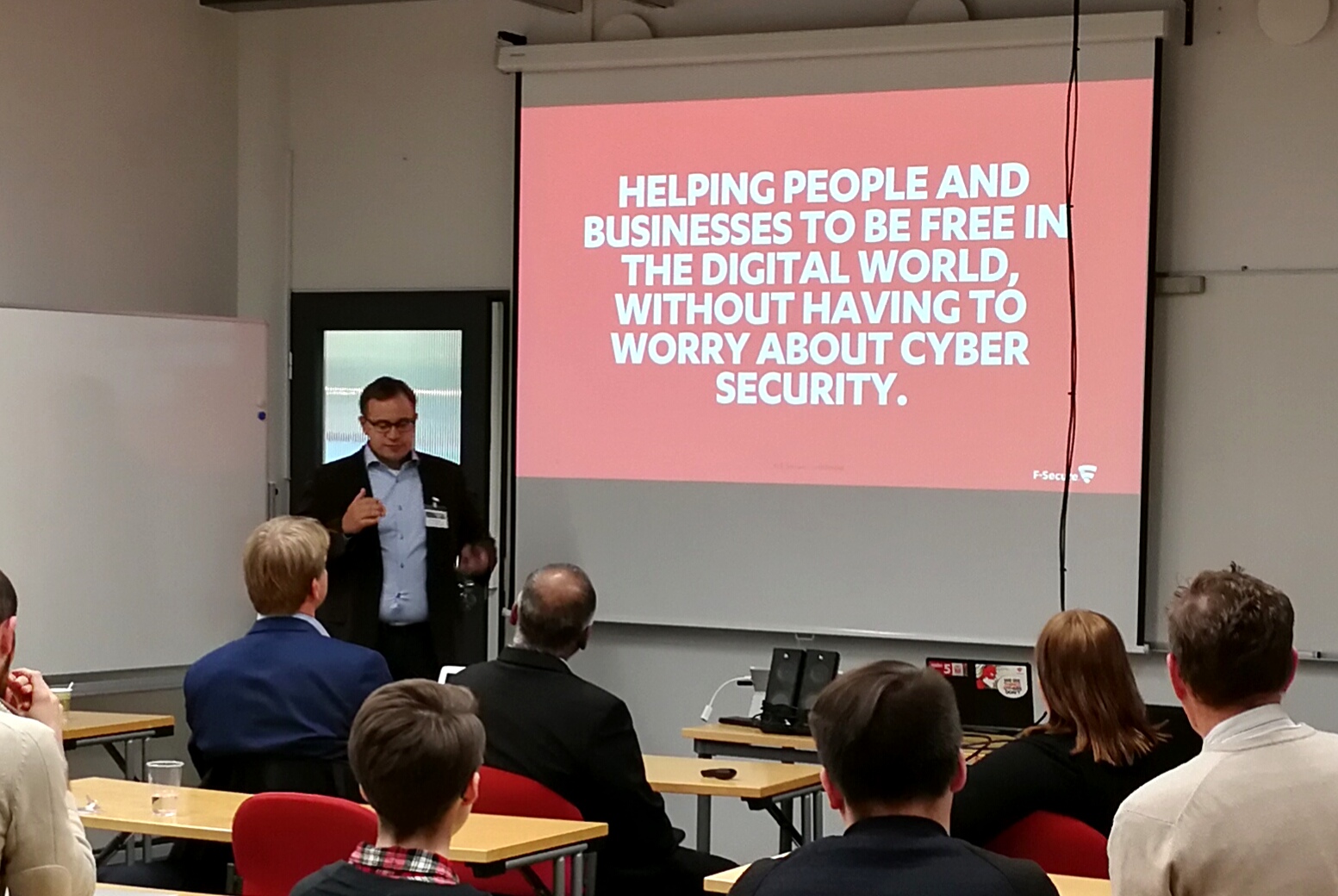 Photograph of Mika Ståhlberg keeping a company presentation for students