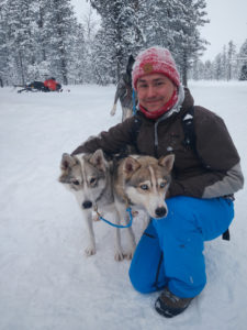 Photograph of Martin Kulhavy with two husky dogs