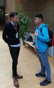 Student discussing with a company representative