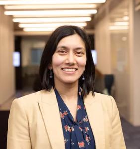 A woman smiling at camera